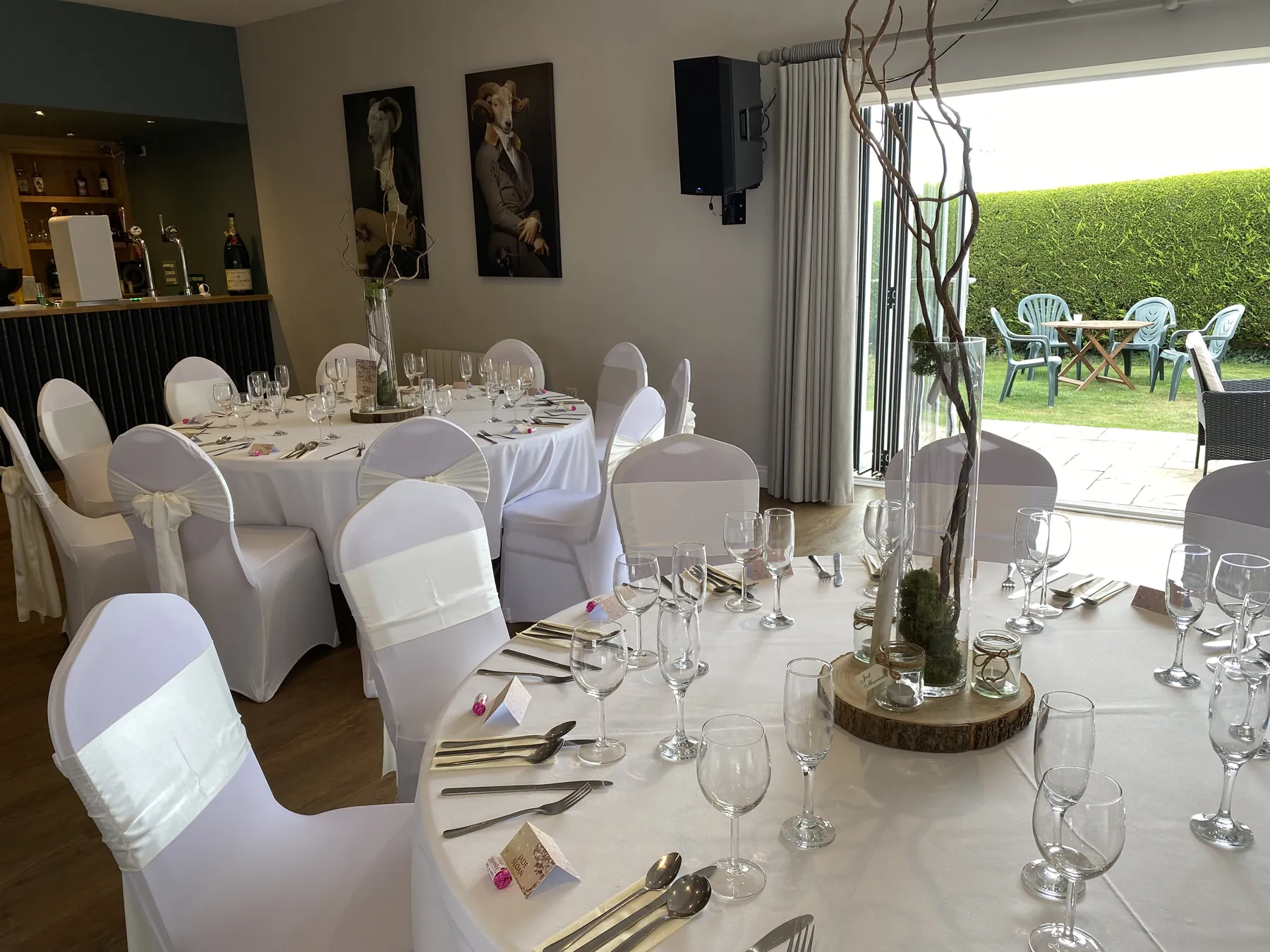 The Squires 1892 suite dressed for a wedding, doors open to the garden